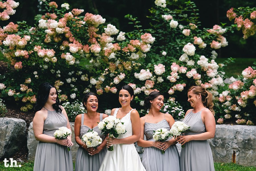 Laughing bridal party portraits at the Springside inn