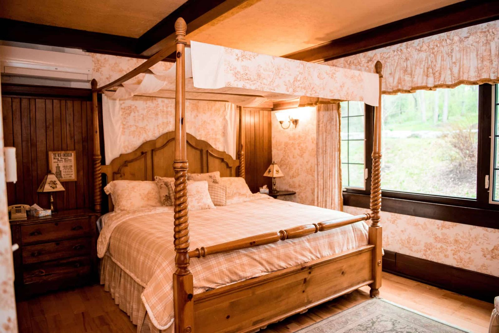 Room 23 interior facing the bed at Springside Inn